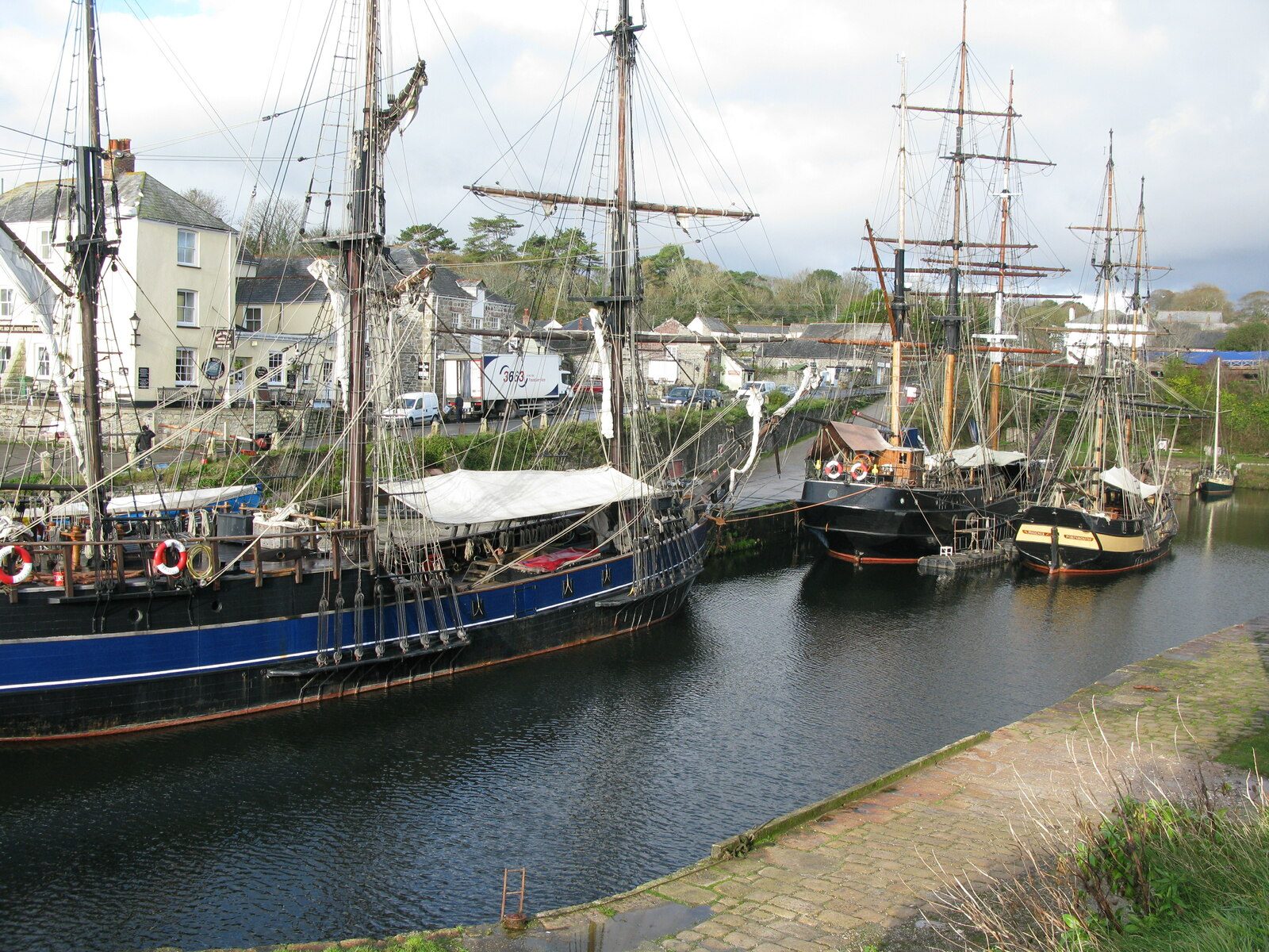 Tall ships moored in Charlestown's Georgian harbour
